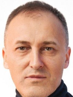 Олег Беленов