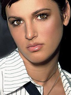 Коринне Жига