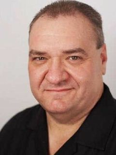 Тони Кост