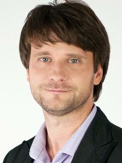 Роман Подоляко