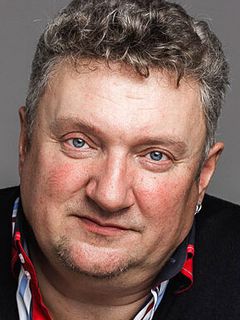 Олег Комаров