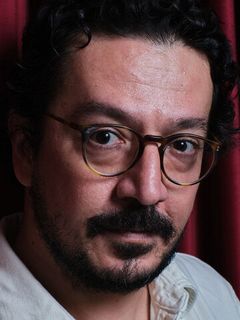 Толга Карачелик