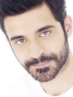 Угур Узунел