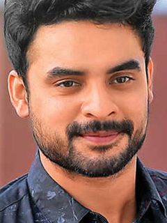 Товино Томас