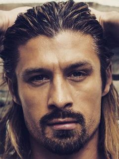 Питер Ли Томас