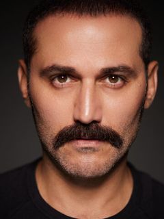 Дженгиз Окуюджу