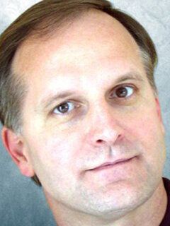 Джеймс Э. Эш