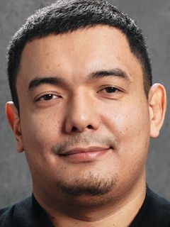 Алишер Утев