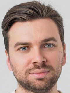 Роман Мельников