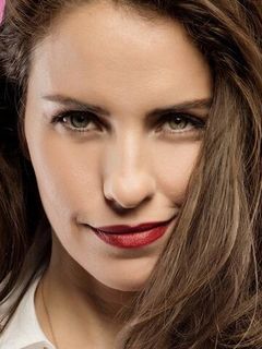 Аслы Тандоан