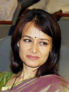 Амала Акинени