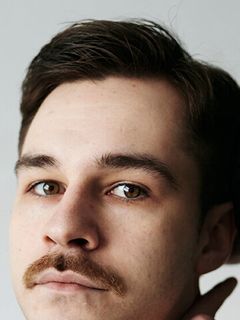 Александр Николаев