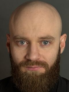 Александр Коломиец