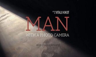 Человек с фотоаппаратом