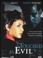 Прикосновение зла