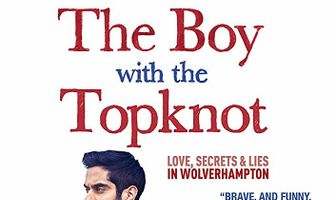 Мальчик с пучком на голове